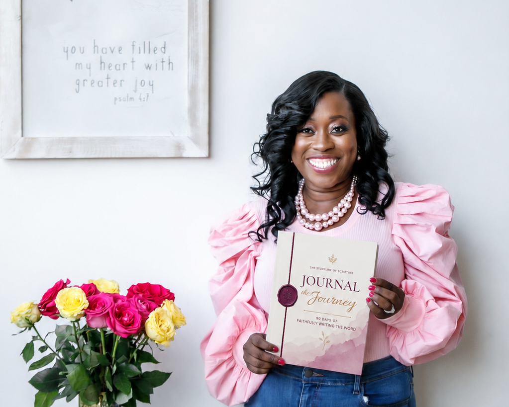 Rachel G. Scott holding the Journal the Journey guided journal, cropped hero version